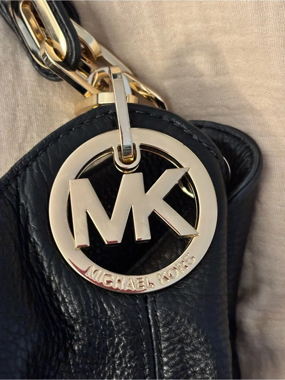 Michael Kors Black Pebbled Leather Hobo with Gold MK Charm
